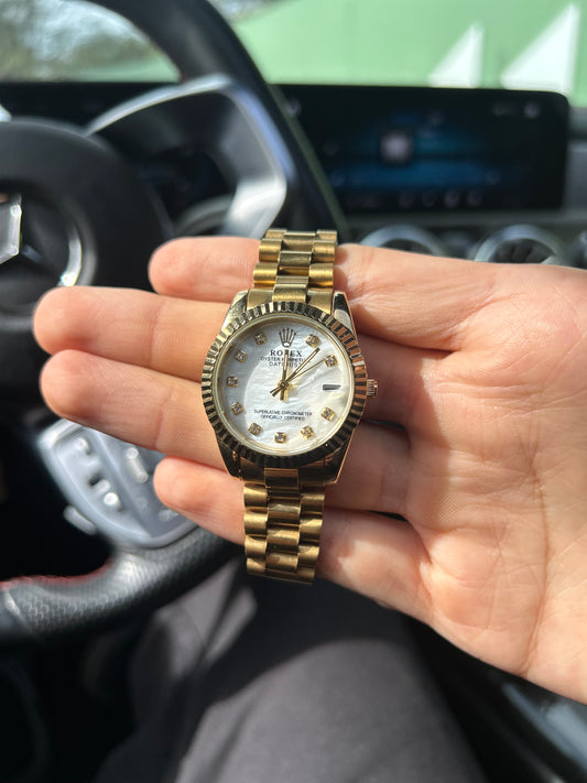 ROLEX GOLD TABLEAU BLANC