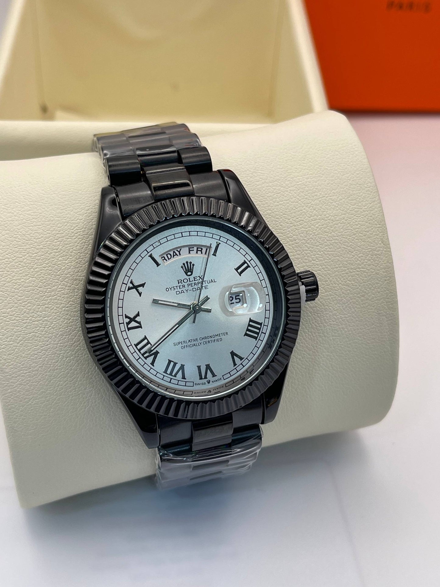 ROLEX DAY DATE  NOIR TABLEAU BLEU CIEL